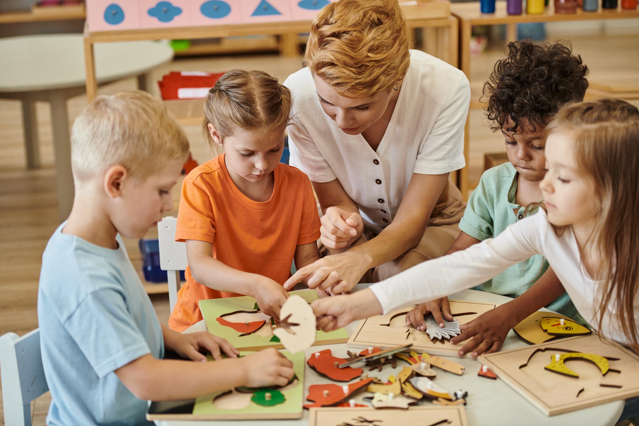 A teacher playing with a group of interracial children using educational toys, creating a fun and inclusive learning environment.